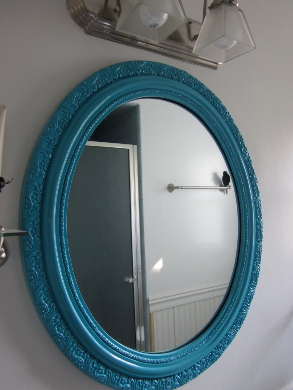 with a fresh coat of paint now the guest bath mirror